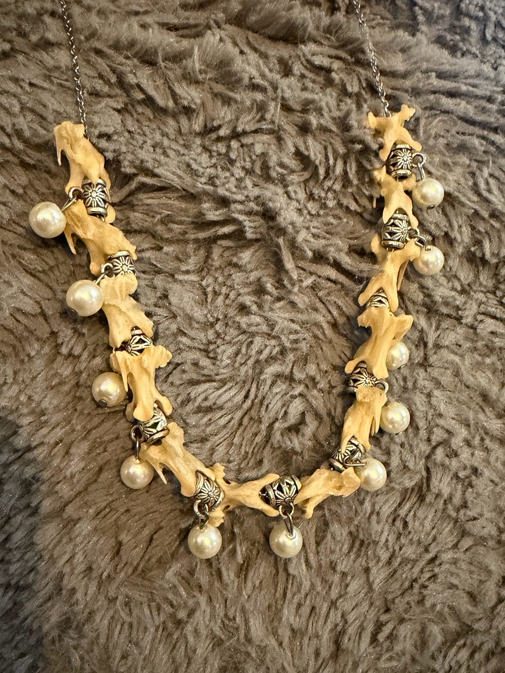 Mink vertebrae and pearl necklace